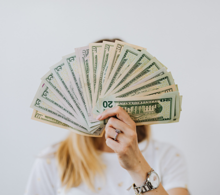 person fanning money